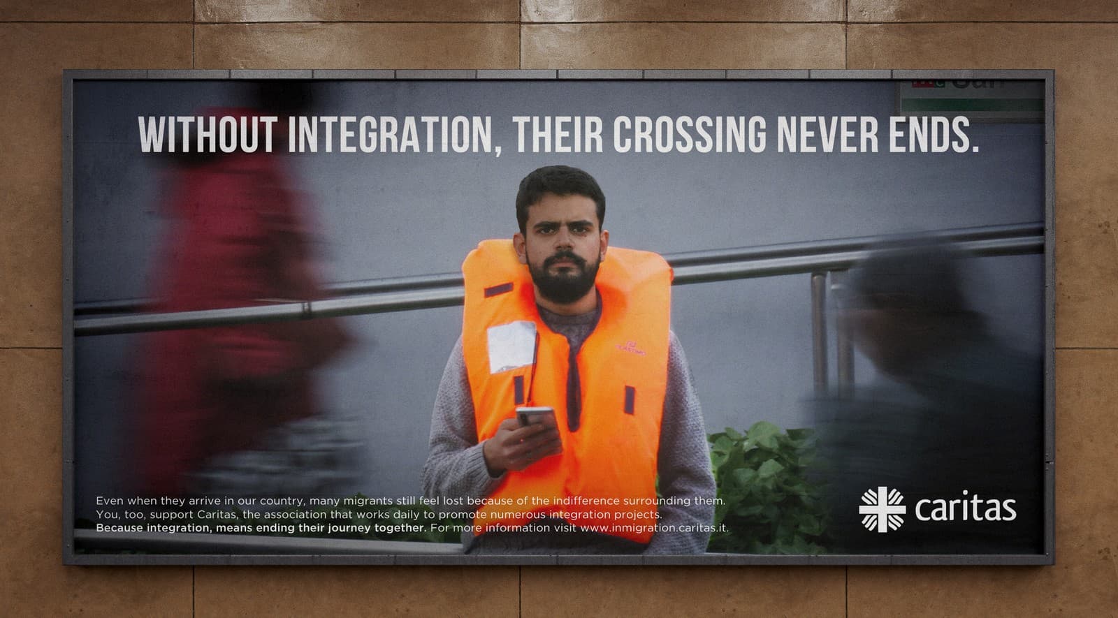 Caritas Integration billboard — migrant wearing a life vest