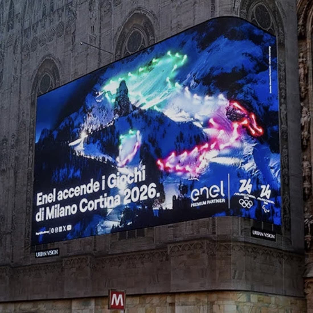 Enel Milano Cortina 2026 — billboard on the Duomo facade